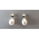 9ct yellow gold diamond and pearl studs good condition