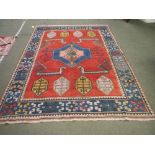 Large Heriz style rug with orange central panel and blue surround border, in contemporary style of