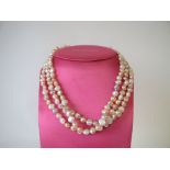 Three row fresh water pearls pink necklace good condition