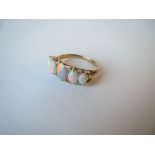 18ct gold five stone opal ring . Size O. 4.3g