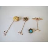 Four gold coloured metal brooches. 17.6g