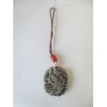 Circular jade pendant carved with a Ho ho bird Fair condition