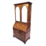 Good Queen Anne walnut bureau bookcase, the bureau with a fitted and stepped interior above a