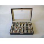 Mixed collection of vintage Swiss watches by Timex, Seconda, Rosco etc in glass top display case (12