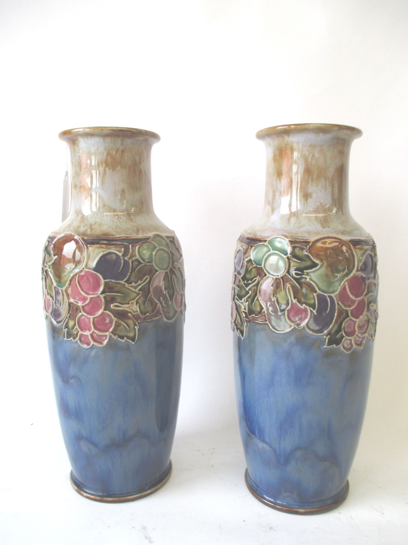Pair Royal Doulton blue ground vases Condition: