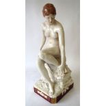 Royal Dux glazed figure of a seated nude 48 cm H Condition: restored head