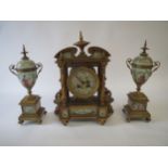 Gilt metal and porcelain clock  with oriental scenes 31x19cm Condition: In fair .