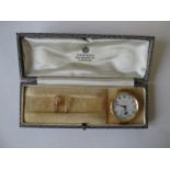 Ladies Asprey yellow metal watch, marked Asprey on the dial, with Asprey box, and 15ct gold buckle