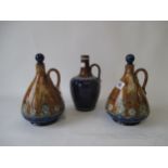 Pair Royal Doulton brown and blue glazed flagon & stoppers James Barrough Ltd Condition: Minor