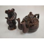 Unusual treacle glaze, twin spout barge teapot & cover and similar Toby Jug and cover Condition: