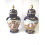 Pair blue ground Vienna vases and covers, decorated with classical figures & gilded decoration