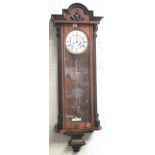 Mahogany and ebonised wall clock with pendulum and weights 114 cm H x 38 cm W Condition: chips to