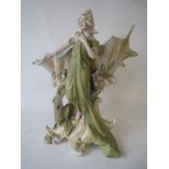 Porcelain figure of a maiden with shell 29 cm H Condition: Good . very minor wear