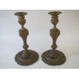 Pair of French cast ormolu candle sticks of Louis XV design 10.5 x 20