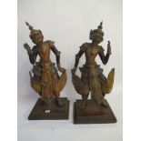 Pair of painted wood Siamese figures mounted on wooden base 70cmH Condition: In fair . , scratches