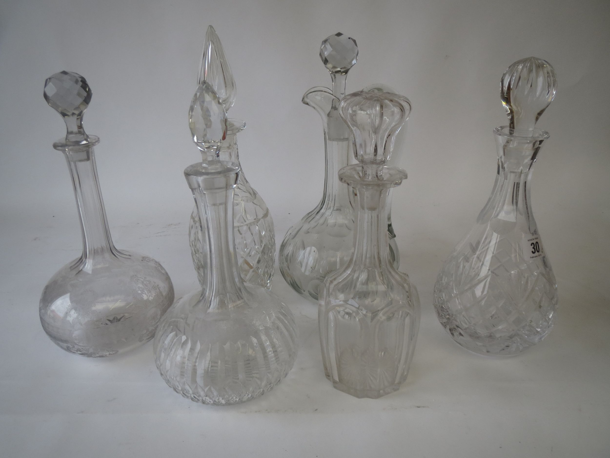 Glass wine jug with stopper & 5 glass decanters & stoppers  1 decanter rim and 1 stopper damaged