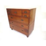 Large C19th teak two piece campaign brass bound chest fitted five short drawers above three long