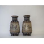 Pair Doulton Lambeth vases decorated with deer, impressed stamp and signatures to base 28cmH