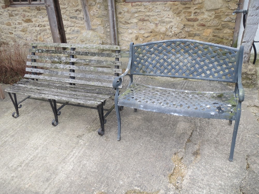 Two garden benches , one slatted wood, one grey metal effect both weathered and worn