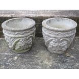 Pair garden urns, with vine leaf decoration weathered