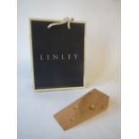 Pine door stop designed by Linley in form of wedge of cheese, in original packing Condition: