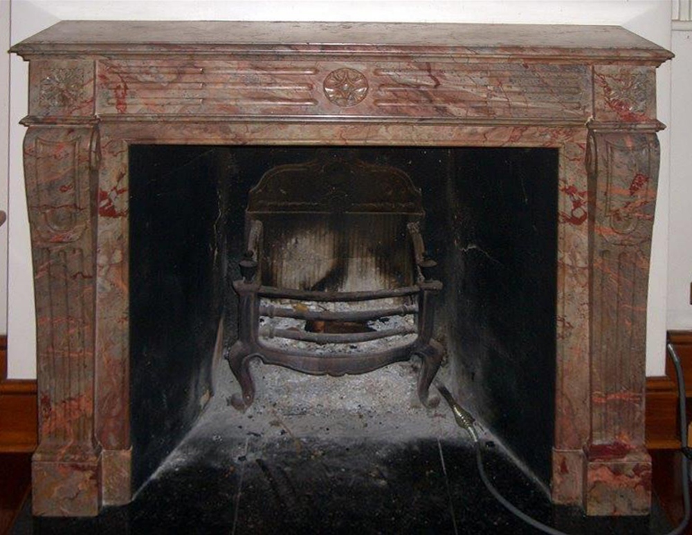 Fine quality and rare English terracotta veined marble box fireplace surround with moulded