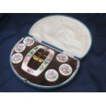 Enamel on silver buckle and button set with floral scenes