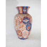 Late C19th Japanese Meiji period imari decorated vase, with facetted sides, in typical pallette,