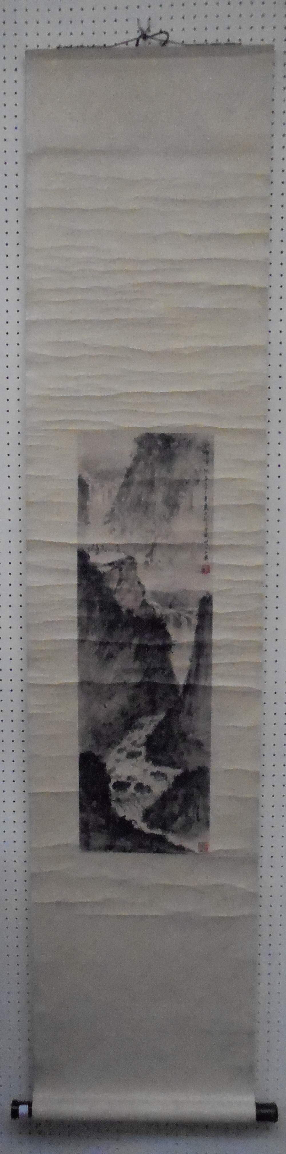 FU BAOSHI (1904-1965) Figures standing beside a waterfall in a mountainous landscape in a scroll ,