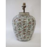 C20th Chinese oviform vase decorated vertical panels of flowers, butterflies and birds, now a