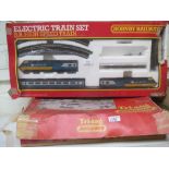 Hornby electric train set with mixed carriages and engines