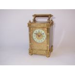 C19th French brass carriage clock filligree front and column sides 14H