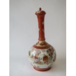 Japanese Kutani bottle vase in typical palette depicting figures in a landscape 36H