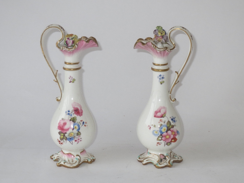 Pair of C19th porcelain ewer shaped oil and vinegar bottles painted with flowers on rococo style - Image 2 of 2