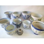 Large qty of blue and white pots and jardinieres etc