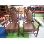 Pair of Scottish walnut carved arm chairs with leather back and seat