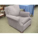 Newly upholstered arm chair with feather cushion, seat and back upholstered in grey fabric