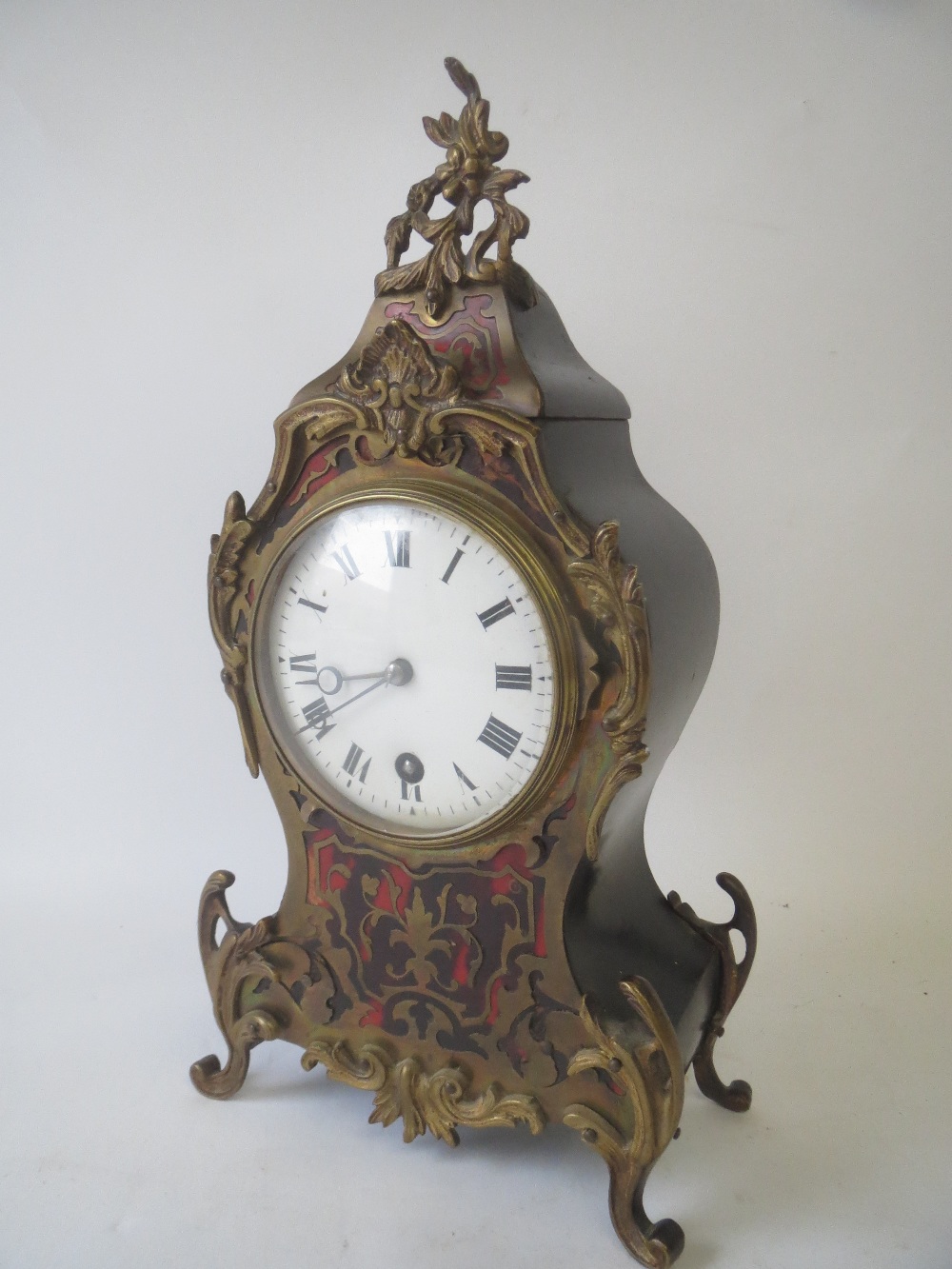 Small French boulle work mantel clock with white enamel dial.  29 cm H