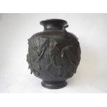 Bronze baluster vase with everted lip and raised elephant decoration, 39cmH