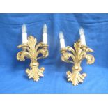 Pair of carved wood and gilded two branch wall lights