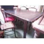 Victorian Oak extending dining table and a further modern dining table