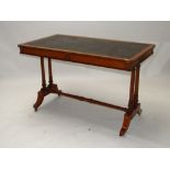 An Edwardian satinwood writing table, with leather inset top over two frieze drawers and dual end