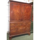 Early C19th mahogany linen press, fitted with four sliding shelves over two short and two long