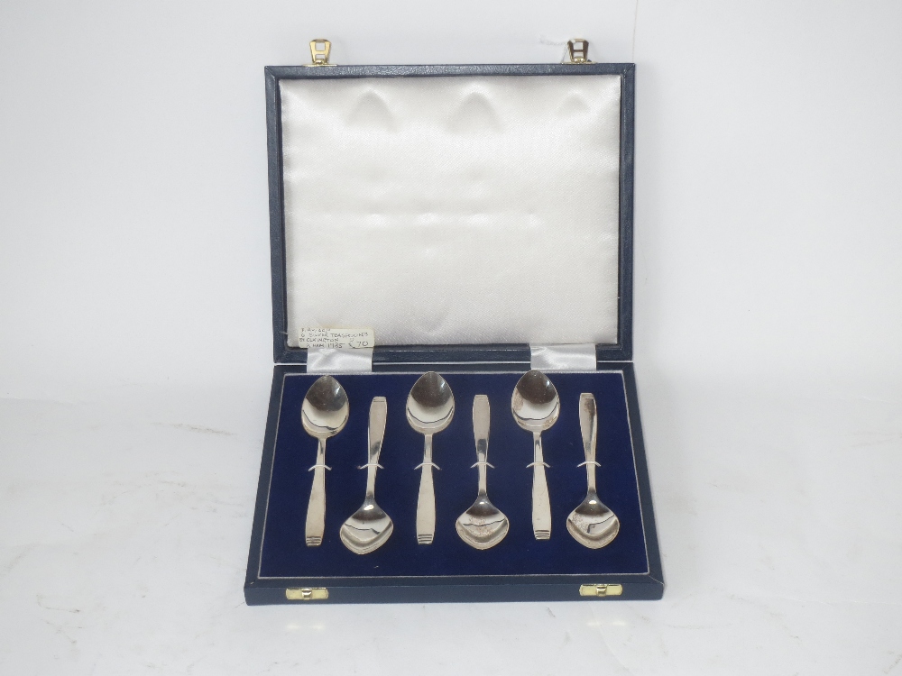 Two sets of six hallmarked silver tea spoons and one set by Elkington and one single tea spoon