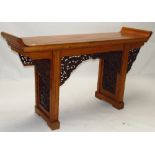 Chinese Elm altar table with pierced carved decoration on end supports 170W