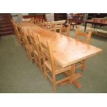 Three modern pine tressle end tables and a set of 14 pine rush seated chairs