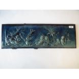 Burmantofts style turquoise/blue glazed pottery plaque depicting cherubs resting in an Egyptian