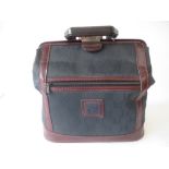 Christian Dior style travel bag with fitted interior