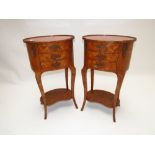 A pair of  Transitional style walnut parquetry inlaid two tier tables fitted three drawers on shaped