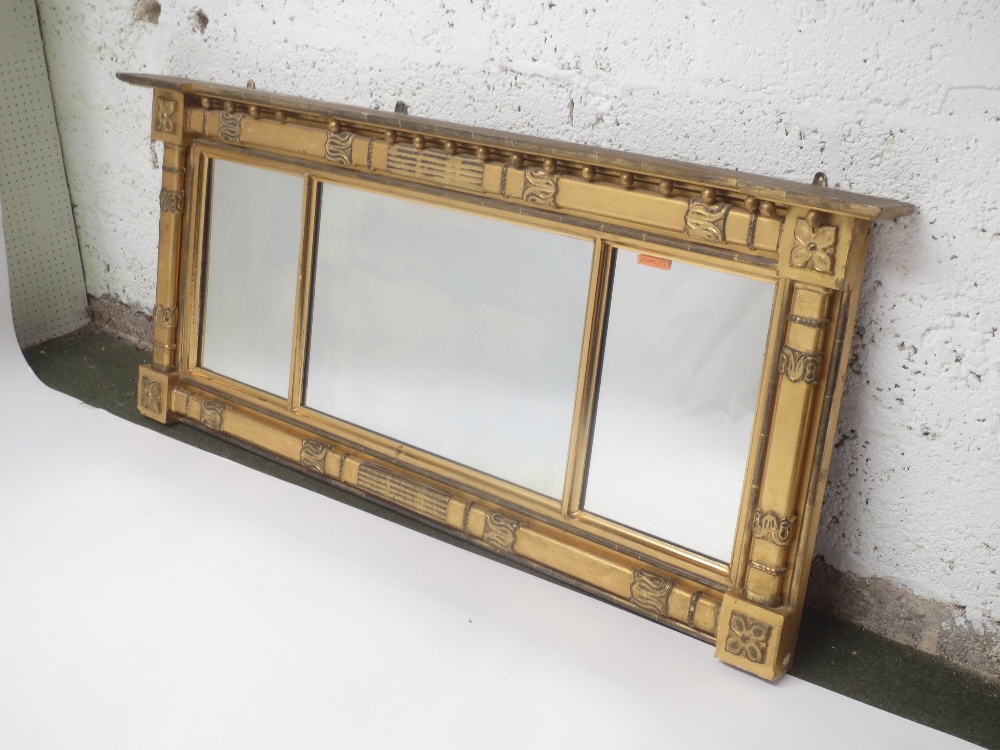 Good quality giltwood over mantel mirror with three sections flanked by columns and finials and on